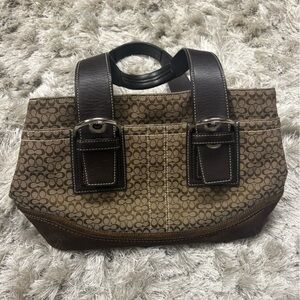 COACH Brown Patterned Handbag with Dark Straps suede bottom